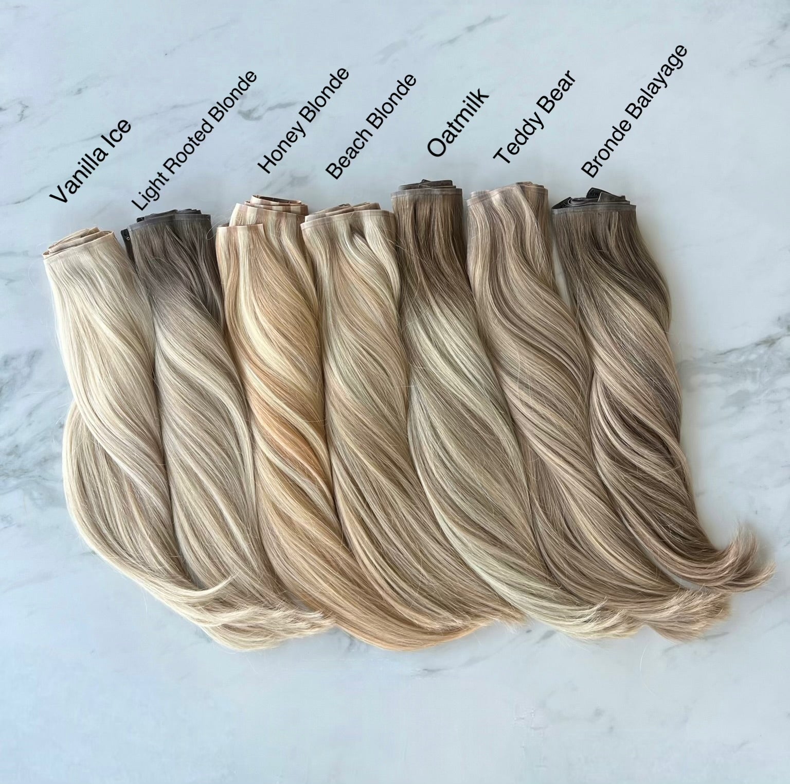 HONEY BLONDE - Ultra Seamless Clip In Human Hair Extensions