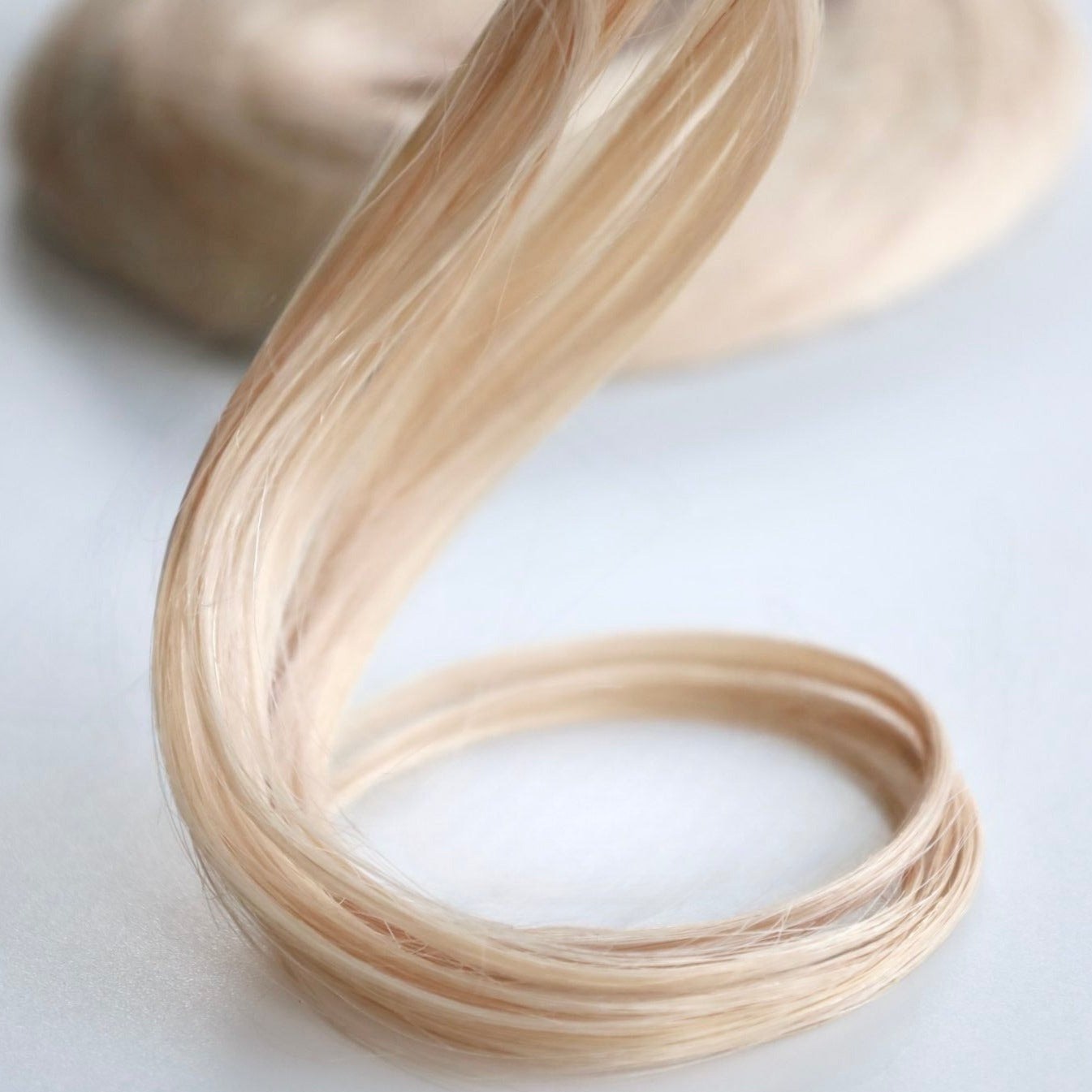 PLATINUM - Ultra Seamless Clip In Human Hair Extensions