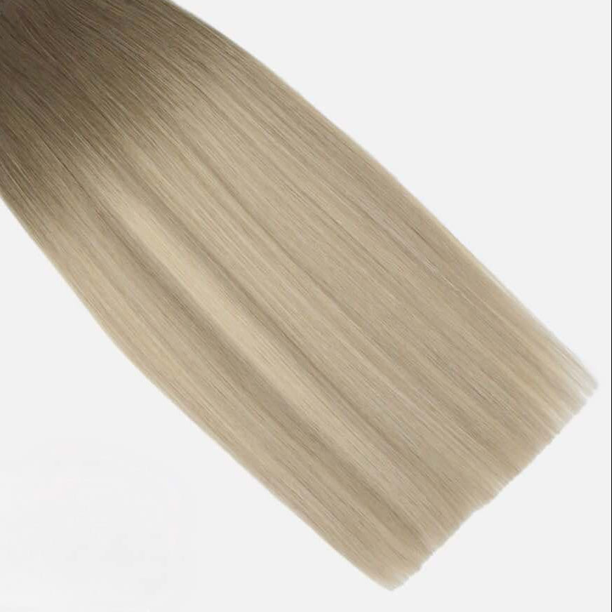 volumi clip-in seamless hair extensions, human hair clip ins, human hair clip in extensions ireland, light blonde, light rooted blonde, santorini blonde, cascata, foxy locks, easilocks, high class hairpieces, clip in hair extensions, balayage blonde, old money blonde, lived in blonde hair extensions